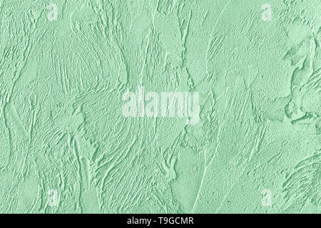 Trendy mint colored rouge concrete textured background for concept or product. Toned image. Stock Photo