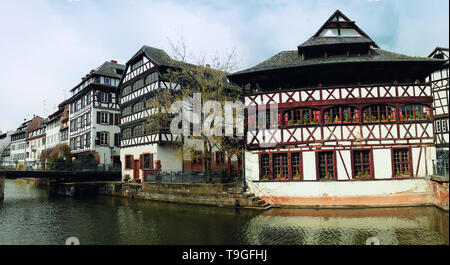 Traditional timber framing houses, Fachwerk architecture on picturesque canals in La Petite France, the medieval fairytale town of Strasbourg, UNESCO  Stock Photo