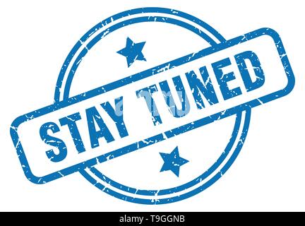 stay tuned round vintage grunge stamp Stock Vector