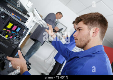 young printer technician Stock Photo
