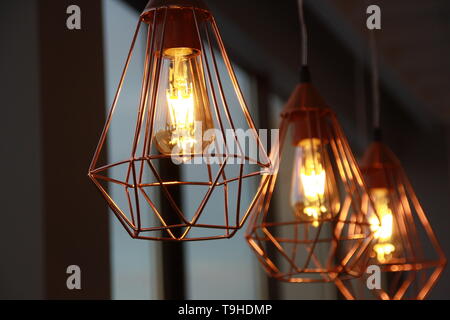 Minimalistic stylish lamps decorated in a modern style. Selective focus. Stock Photo