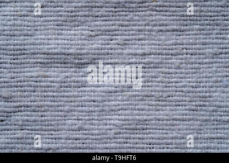 White fabric texture or background. Detail of asian white carpet in Bali, Indonesia. Close up Stock Photo