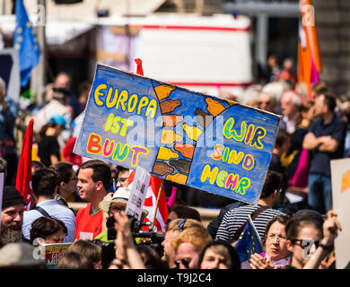 Frankfurt, Germany. 19th May, 2019. A poster 'Europe is colourful - we are more' is held up on the opera square. Under the motto 'A Europe for All - Your Voice Against Nationalism', more than 150 organisations in Germany and European cities are calling for demonstrations. Credit: dpa picture alliance/Alamy Live News Stock Photo