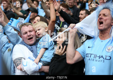 London, UK. 18th May, 2019. Manchester city fans celebrate after the game. The Emirates FA Cup final, Manchester City v Watford at Wembley Stadium in London on Saturday 18th May 2019.  this image may only be used for Editorial purposes. Editorial use only, license required for commercial use. No use in betting, games or a single club/league/player publications . Credit: Andrew Orchard sports photography/Alamy Live News Stock Photo