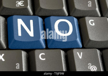 Word NO written with blue keys on computer keyboard. Stock Photo