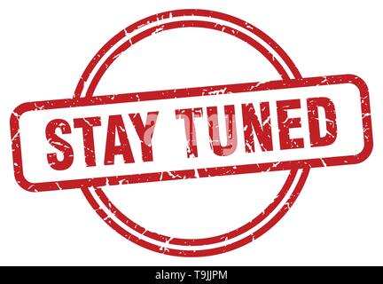 stay tuned round vintage grunge stamp Stock Vector