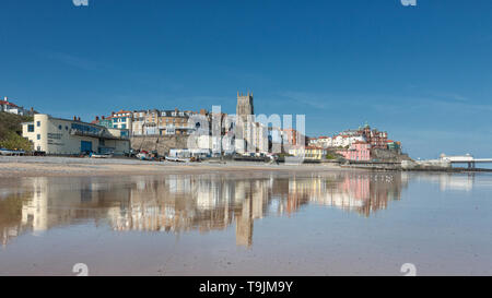 Victorian town of Cromer reflected in the wet sands at low tide, Norfolk, East Anglia Stock Photo