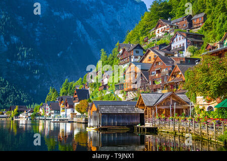 Traditional old wooden houses in famous Hallstatt mountain village at Hallstattersee lake in the Austrian Alps in summer, region of Salzkammergut, Aus Stock Photo