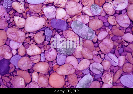 Pebble Stones Walkway in Pink and Purple Tone for Background or Wallpaper Stock Photo