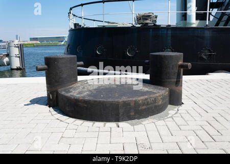 A large and heavy double cargo ship bollard Stock Photo