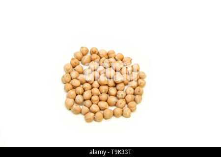 The small amount, a pile, of chick peas isolated on a white background. Stock Photo