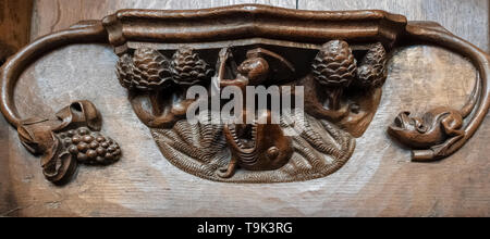 A medieval misericord depicting Jonah being cast ashore on Nineveh, Ripon Cathedral, Yorkshire, UK Stock Photo