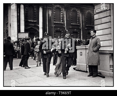 Vintage B&W news image of demonstrator struggling with police as the British Union of Fascists from Kentish Town, led by Sir Oswald Mosley parade and march in London during local elections Sunday July 4, 1937 Trafalgar Square London UK Stock Photo