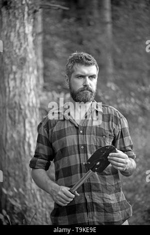 Eco lifestyle. United with environment. Handsome lumberjack. Man