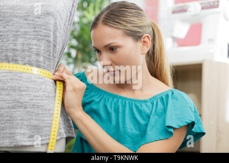 dressmaker at work Stock Photo