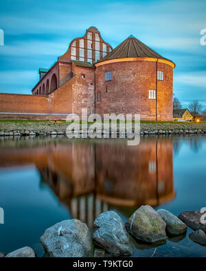 After the sun has set, Landskrona citadel looks beautiful in the blue hour light. Stock Photo