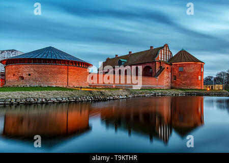 After the sun has set, Landskrona citadel looks beautiful in the blue hour light. Stock Photo