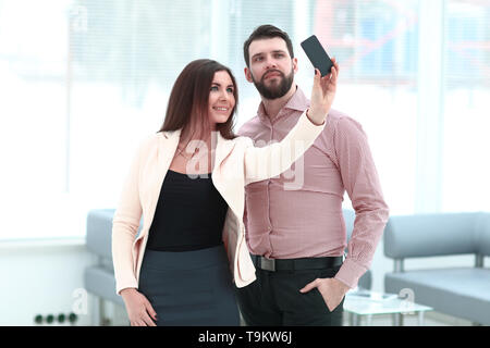 modern business couple taking selfie in office .photo with copy space Stock Photo