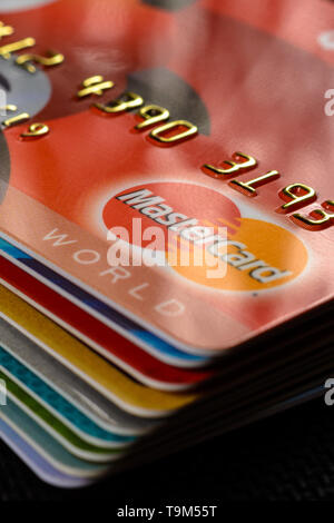 Lviv, Ukraine - 26 April 2019 : Close-up of mastercard credit cards placed on a dark background 2020 Stock Photo