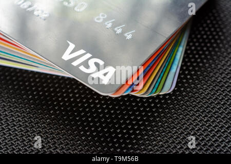 Lviv, Ukraine - 26 April 2019 : Close-up of Visa credit cards placed on a dark background 2020 Stock Photo