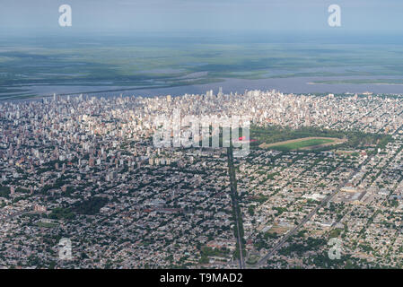 Aerial image showing the skyline and extent city of Rosario in Argentina, with in particular the distrito centro witht he remarkable Sociedad Del Esta Stock Photo