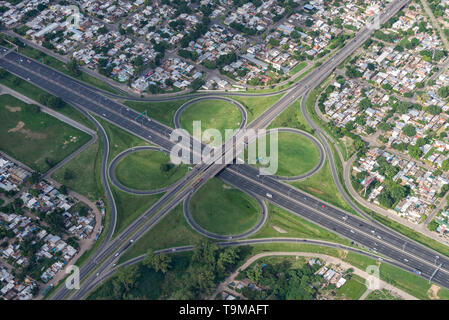 Aerial image showing the highway butterfly exit 2 at Belgrano, crossing of Av. Circunvalacion 25 de Mayo and Au 9 in Rosario, Argentina Stock Photo