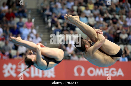 Great Britain's Thomas Daley and Grace Reid in the 3m Mixed Synchro Springboard during day three of the Diving World Series at London Aquatics Centre, London. Stock Photo