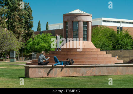 TEMPE, AZ/USA - APRIL 10, 2019: Unidentified individuals on the campus of Arizona State University. Stock Photo