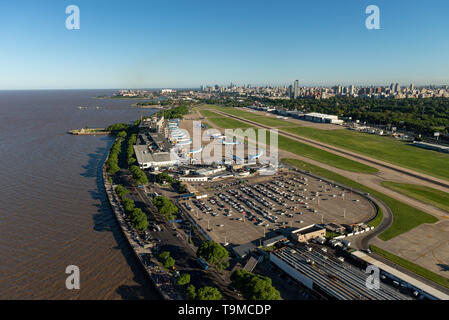 Aerial image showing the full Aeroparque Internacional Ing. Jorge Alejandro Newbery at the river Rio de la Plata with the city of Buenos Aires in the  Stock Photo