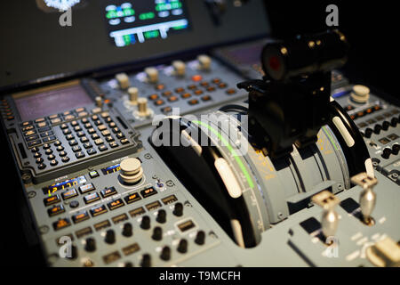 throttle levers in control panel in the cockpit of a jet plane Stock ...