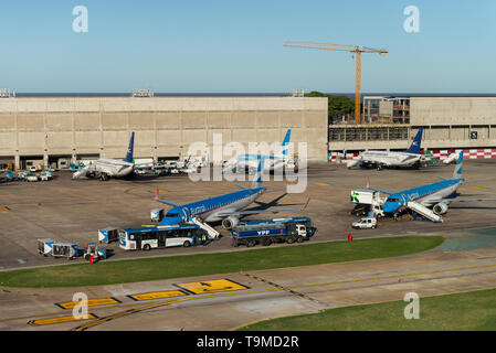 Aerial image showing planes of type Embraer ERJ-190AR of the company Austral boarding at Jorge Newbery Airfield (Spanish: Aeroparque 'Jorge Newbery',  Stock Photo