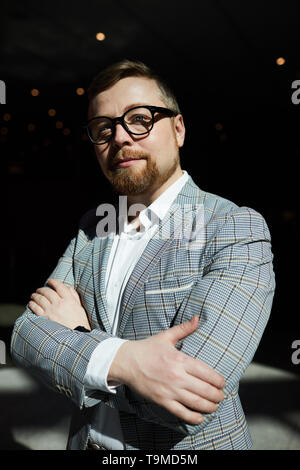 Successful bearded man on stage Stock Photo