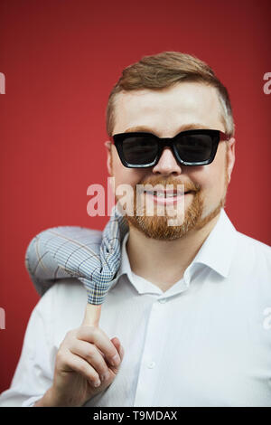 Smiling bearded man in sunglasses Stock Photo