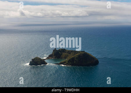 Aerial image of the idyllic islet of Vila Franca do Campo (Ilhéu de Vila Franca) with the Atlantic ocean in the background.   This is a tiny islet jus Stock Photo