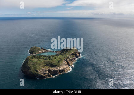 Aerial image of the idyllic islet of Vila Franca do Campo (Ilhéu de Vila Franca) with the Atlantic ocean in the background.   This is a tiny islet jus Stock Photo