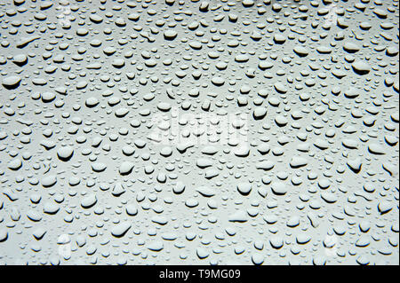 Pattern of  rain drops on a car windshield Stock Photo