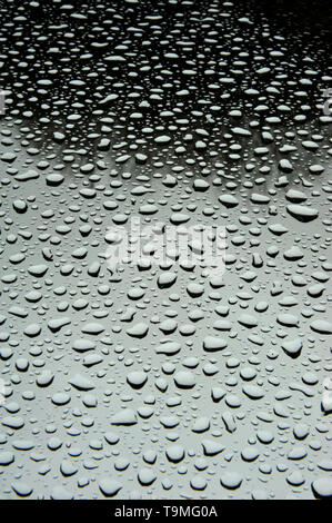 Pattern of  rain drops on a car windshield Stock Photo