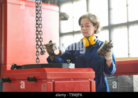 Female Mover at Plant Stock Photo