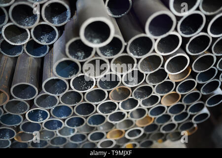 Metal Pipes in Warehouse Stock Photo