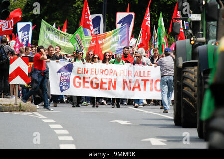 Frankfurt, Germany. 19th May 2019. Ttractors lead the march. More than 10,000 people marched through Frankfurt, under the Motto 'One Europe for all - Your voice against nationalism’, one week ahead of the 2019 European Election. They called for a democratic Europe and to set a sign against the emerging nationalism in Europe. The march was part of a European wide protest. Stock Photo