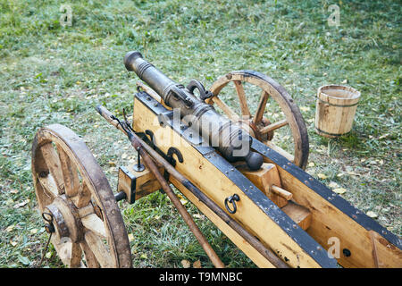 Old Russian cannon of the 17th century stands on the grass Stock Photo