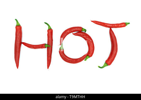 Word H-O-T spelled with red chillis on white background. Stock Photo