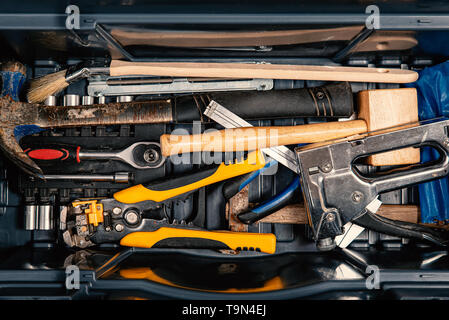 Set of working tools in tool box, top view. DIY theme Stock Photo