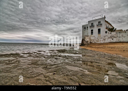 Dramatic landscape of Chipiona beach, in the province of Cadiz, Spain, on a cloudy day Stock Photo