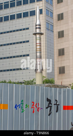 SEOUL / SOUTH KOREA - JULY 1, 2013: Model / sculpture / art of rocket found while walking the streets of Seoul, South Korea Stock Photo