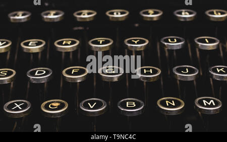 Vintage antique typewriter keys on a black background isolated Stock Photo