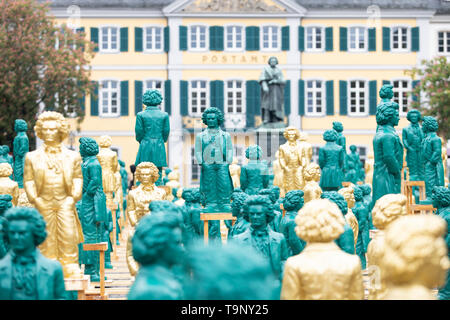 Bonn, Deutschland. 17th May, 2019. 700 Ludwig van Beethoven sculptures stand on Bonn's Muensterplatz in front of the historic Beethoven monument. The sculptures were created by Prof. dr. Ottmar Hoerl (Horl) designed. A public action on the upcoming 250th birthday of Ludwig van Beethoven; on 17.05.2019 in Bonn/Germany. | usage worldwide Credit: dpa/Alamy Live News Stock Photo