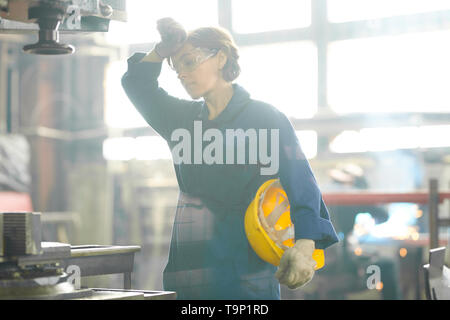 Tired Female Worker Stock Photo