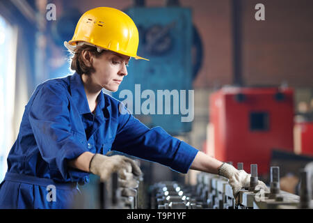 Female Worker Side View Stock Photo