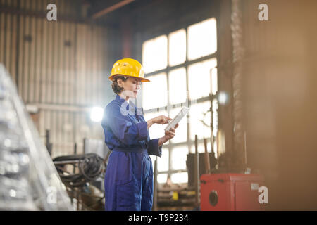 Modern Female Worker Side View Stock Photo